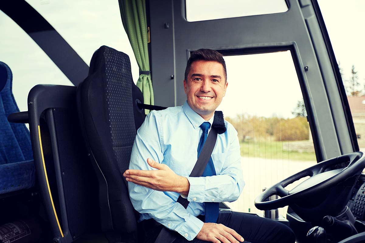 Bus driver welcoming passenger