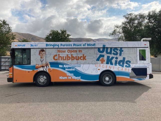 Fully wrapped bus advertisement